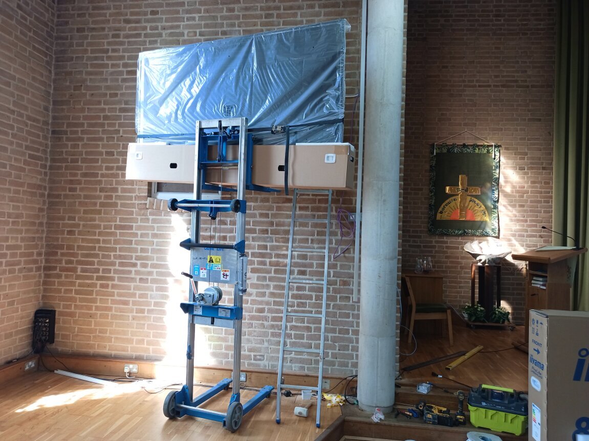 Engineer installing AV cabling